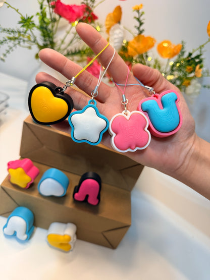Clicker Charmers – Pocket-Size Fidget Clickers for Everyday Play (Set of 4)