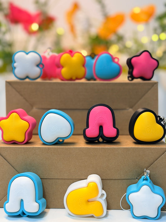 Clicker Charmers – Pocket-Size Fidget Clickers for Everyday Play (Set of 4)