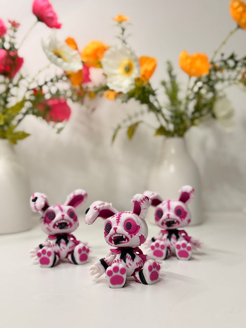 Figura coniglietto rosa con cuciture